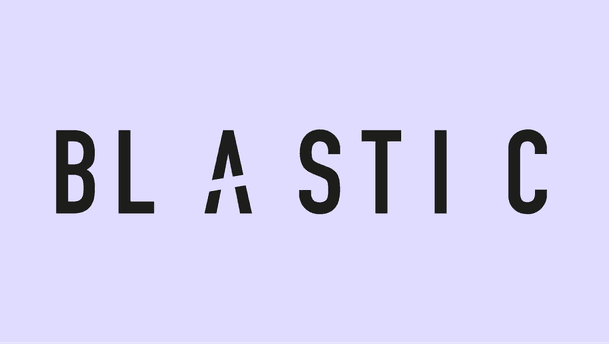 BLASTIC is presented as a minimalist black wordmark centered on a pale lavender background. The design features tall, uppercase, geometric lettering with wide spacing, and a stylised “A” that has a sharp break through its middle, producing a fractured, blasted effect.